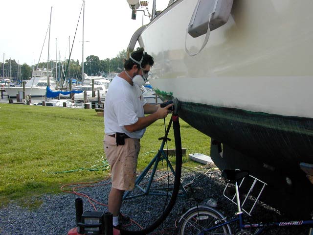 Sanding off the old boot-stripe.